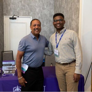 Cameron Brown and Merrill Flood (PiR) at a regional conference